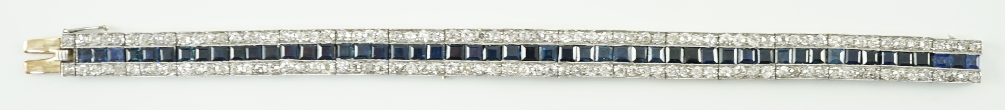 A 1920’s white gold, sapphire and diamond set triple line bracelet